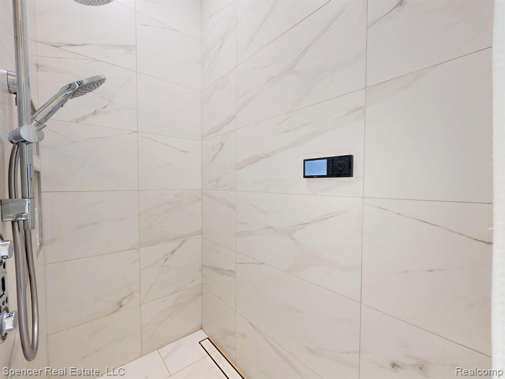 571 Dunleavy Drive, Highland, MI 48356 — Photo 18