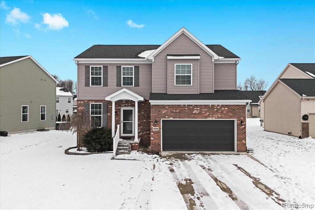 2226 Wood Lane, Howell, MI 48843 — front exterior