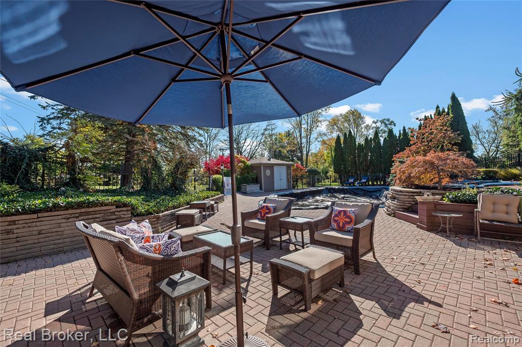 View of swimming pool with patio surround