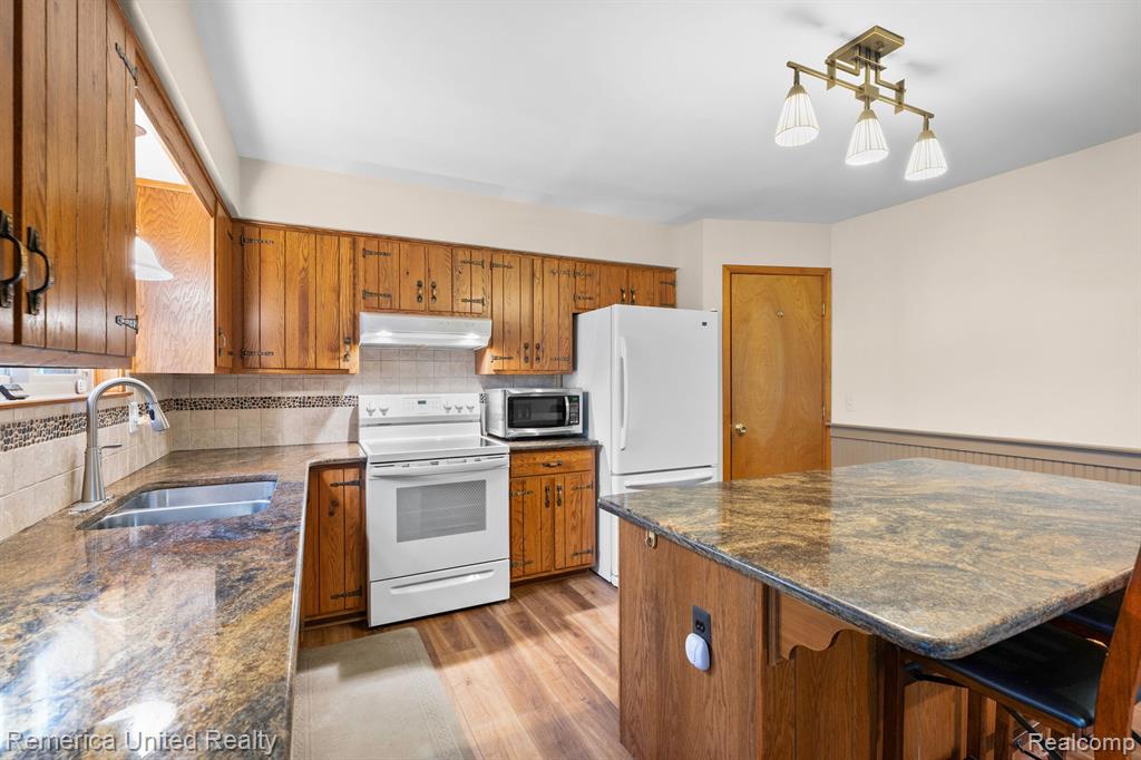 5112 KIERSTAN Drive, Brighton, MI 48114 — Photo 22
