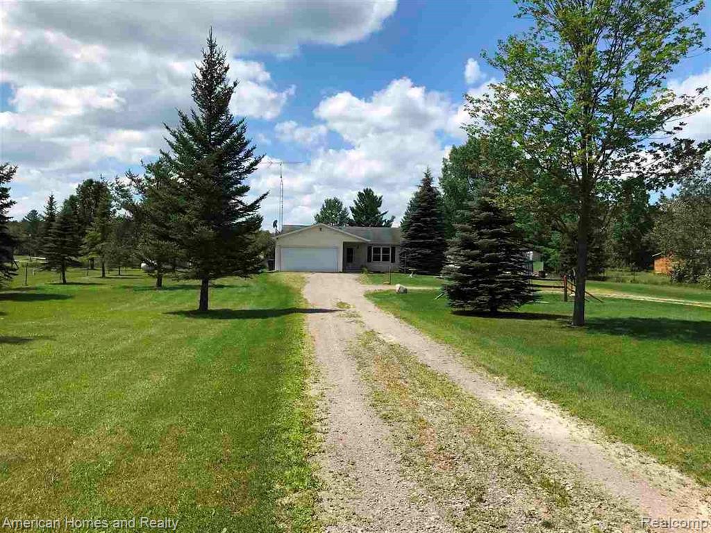 1164 S McArdle Road, Tawas City, MI 48763 — front exterior