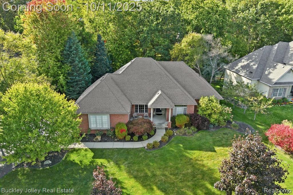 9430 Sheltering Oaks Drive, Brighton, MI 48114 — front exterior