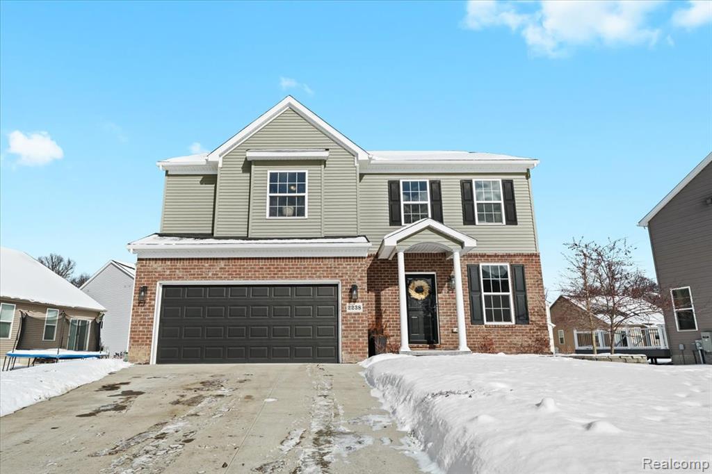 2238 Wood Lane, Howell, MI 48843 — front exterior