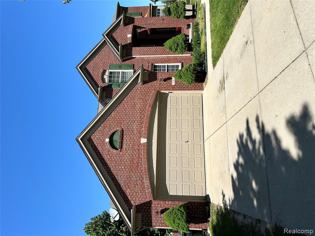 7383 Tottenham, Utica, MI 48317 — front exterior