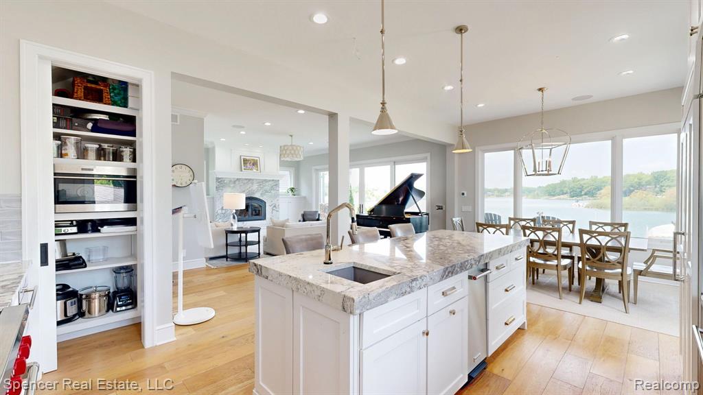 571 Dunleavy Drive, Highland, MI 48356 — Photo 12