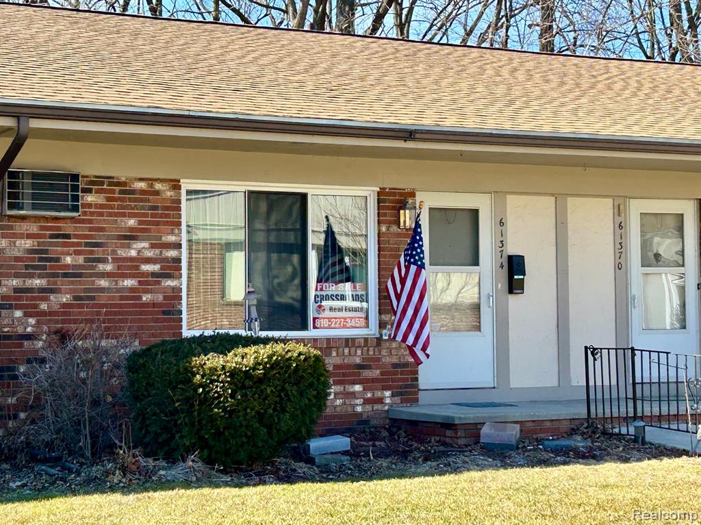 61374 Heritage Boulevard, 5, South Lyon, MI 48178 — front exterior