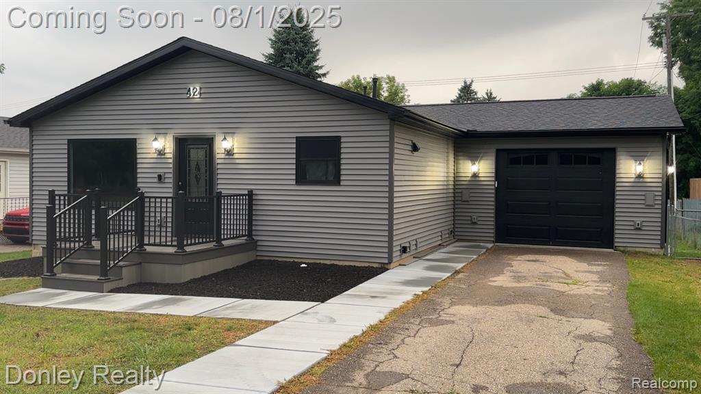 42 Hartley Street, Lapeer, MI 48446 — front exterior