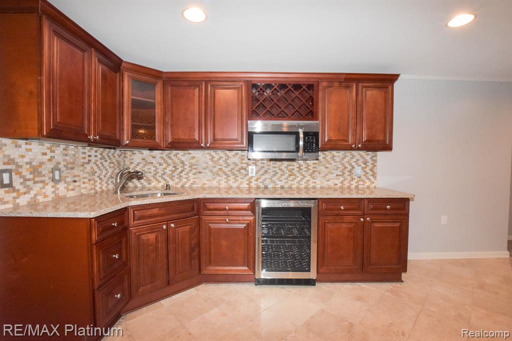 9037 RIDGEFIELD Drive, Brighton, MI 48114 — Photo 51