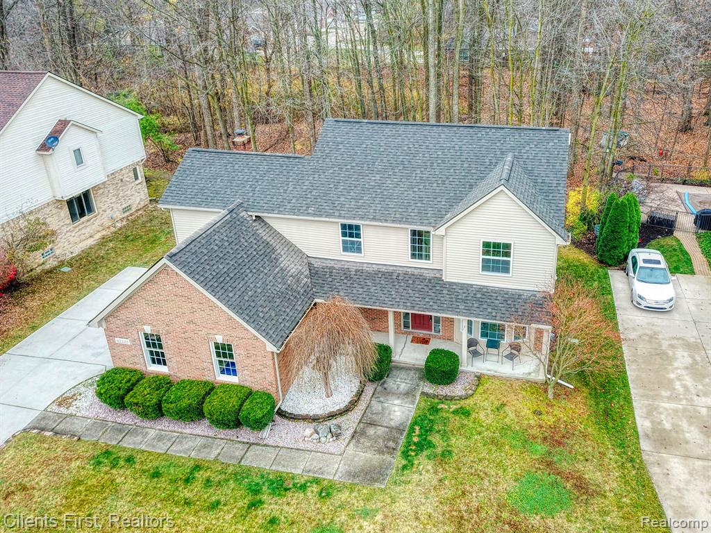 42103 WOODCREEK Lane, Canton, MI 48188 — front exterior