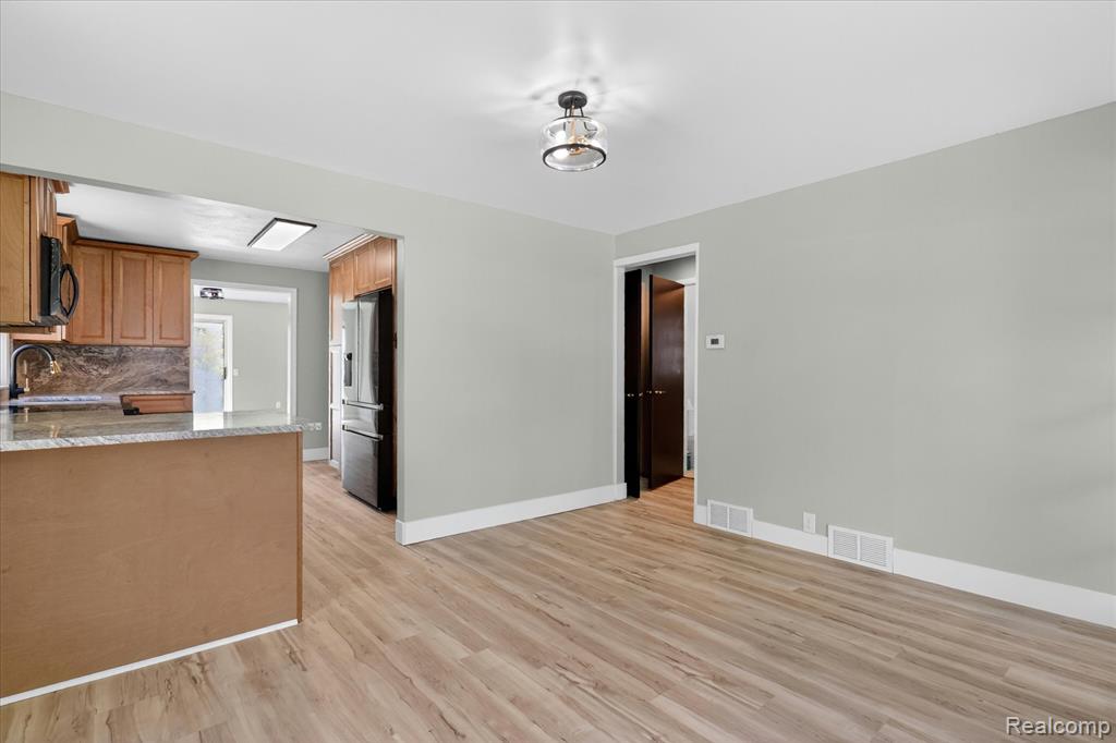 677 Lucille Drive, Wolverine Lake, MI 48390 — Photo 9