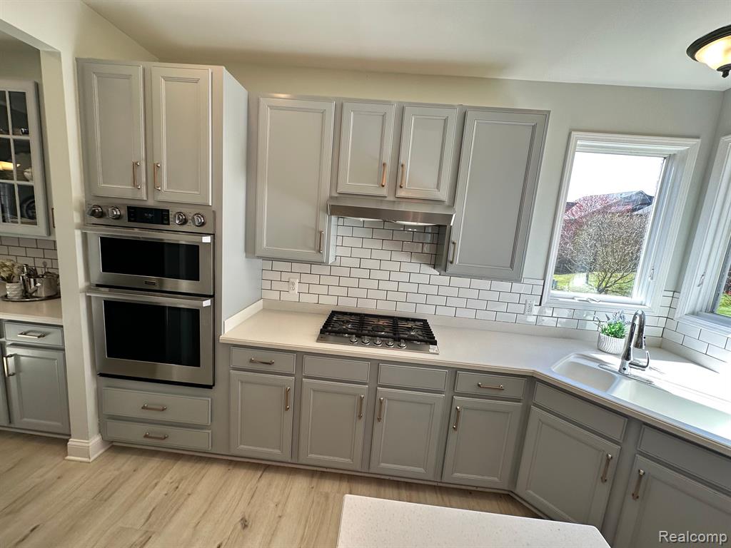 16983 COURVILLE Drive, Northville, MI 48168 — Photo 21