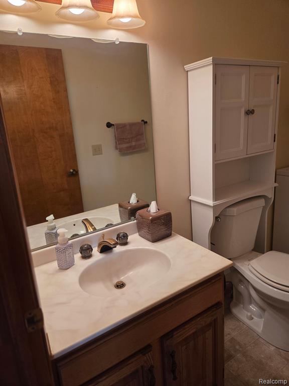 560 OAKBROOK Circle, Flushing, MI 48433 — Photo 17