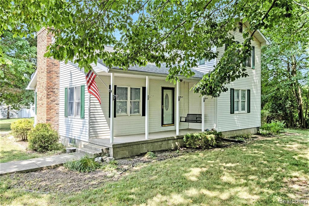 8327 Wiggins, Howell, MI 48855 — front exterior
