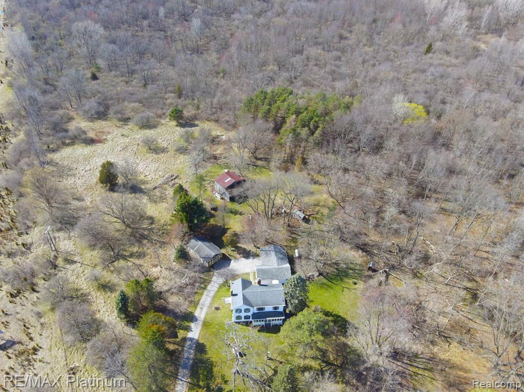 565 SLEAFORD Road, Howell, MI 48843 — front exterior