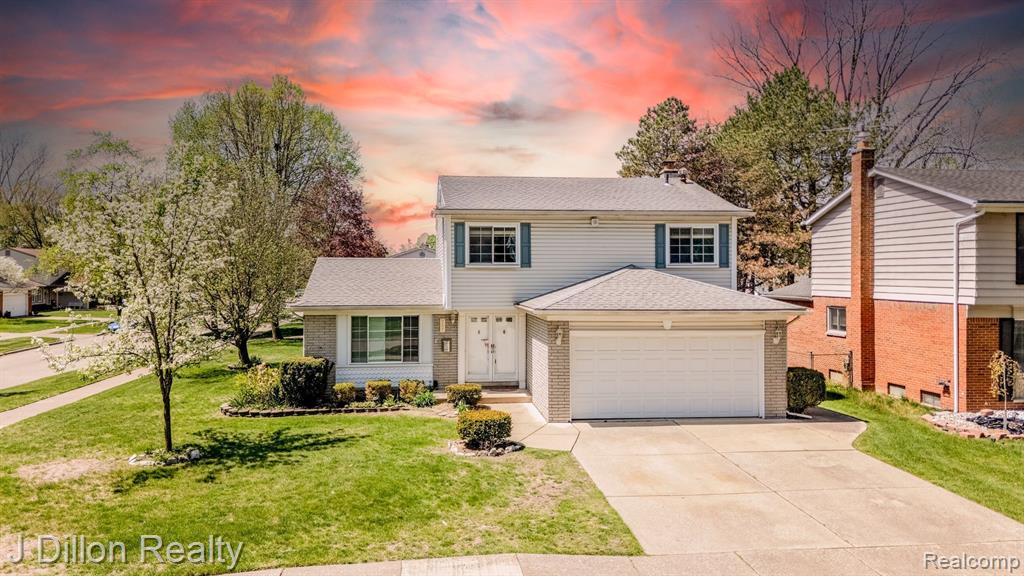 9121 TAVISTOCK Drive, Plymouth, MI 48170 — front exterior
