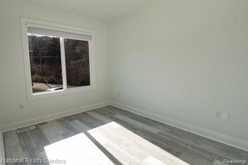 8819 LAGOON Drive, Brighton, MI 48116 — Photo 22