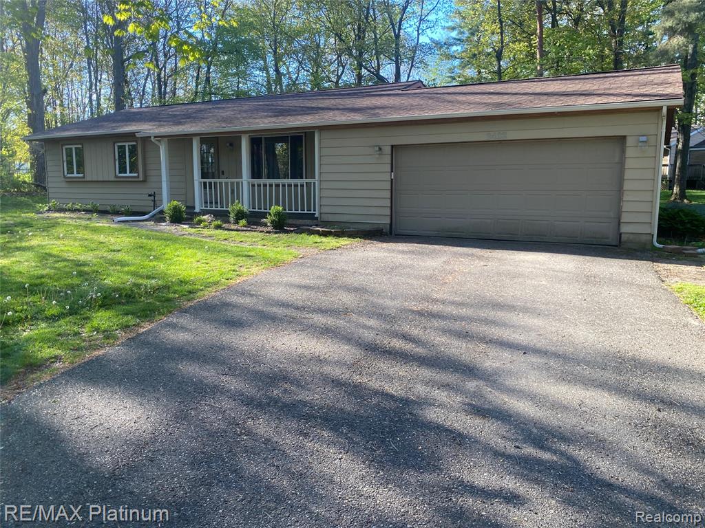 2482 Livernois Drive, Howell, MI 48843 — front exterior