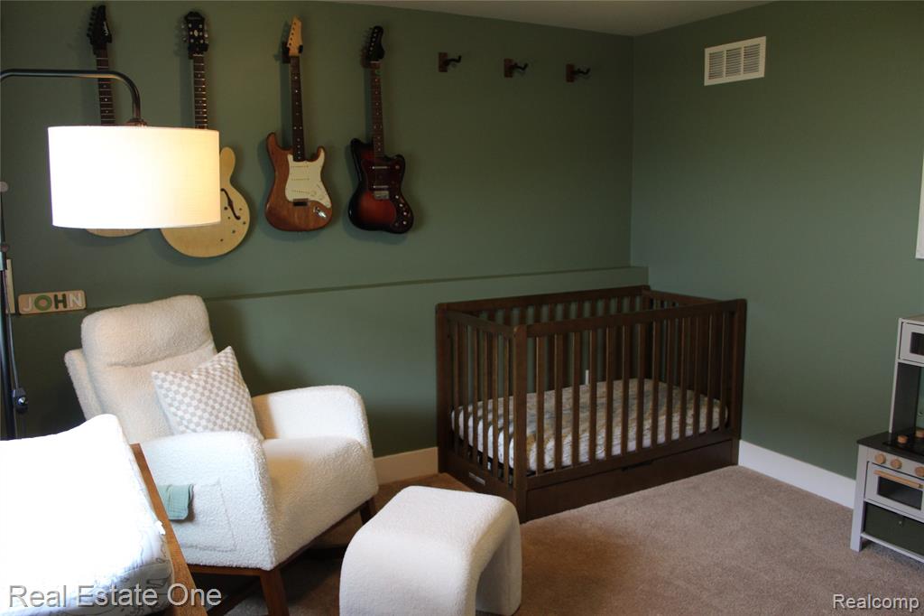 8662 Pinnebog River Drive, Fowlerville, MI 48836 — Photo 19
