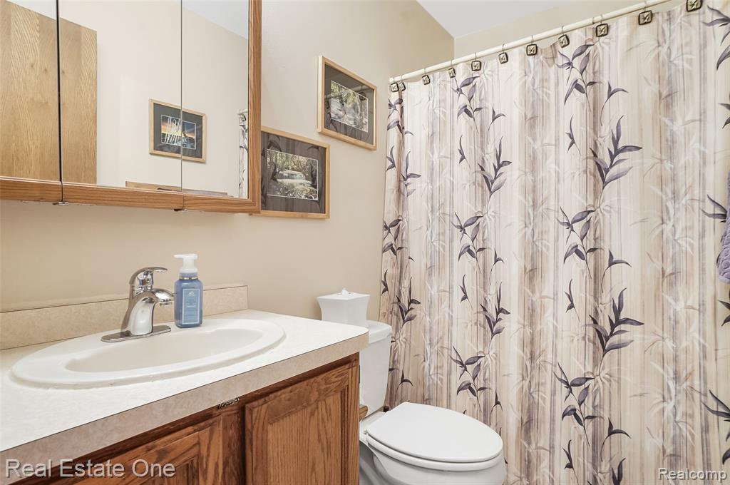 59652 Sunridge Drive, New Hudson, MI 48165 — Photo 16