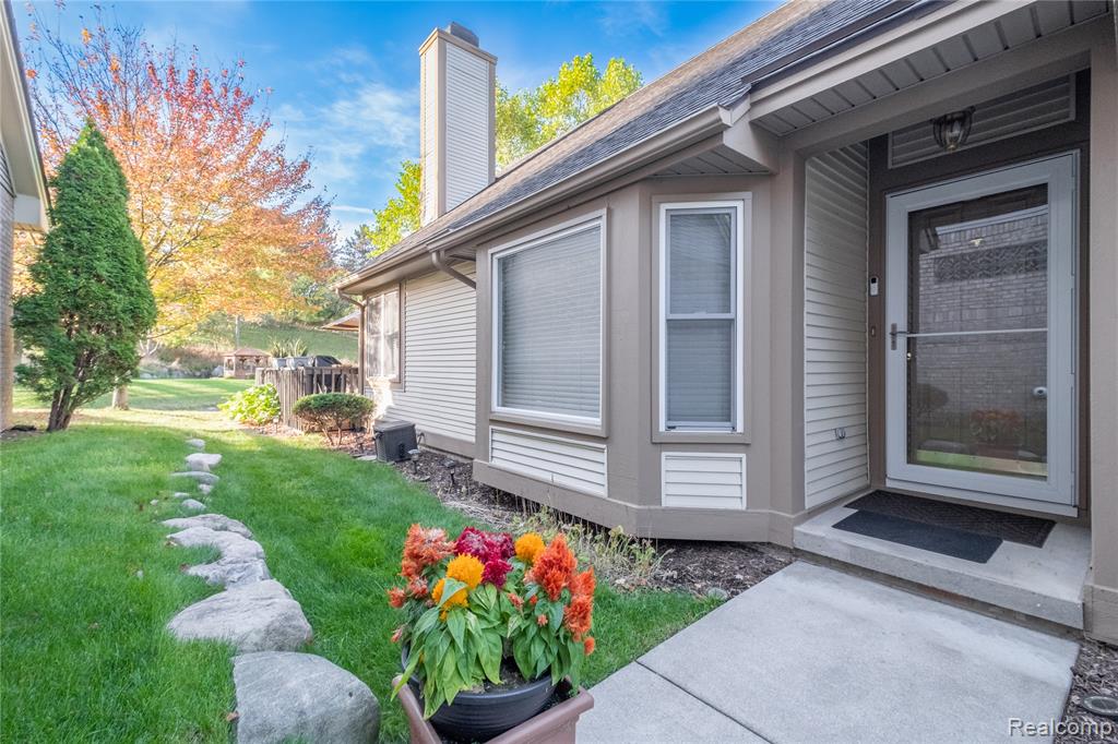 919 Whisperwood Drive, Fenton, MI 48430 — front exterior