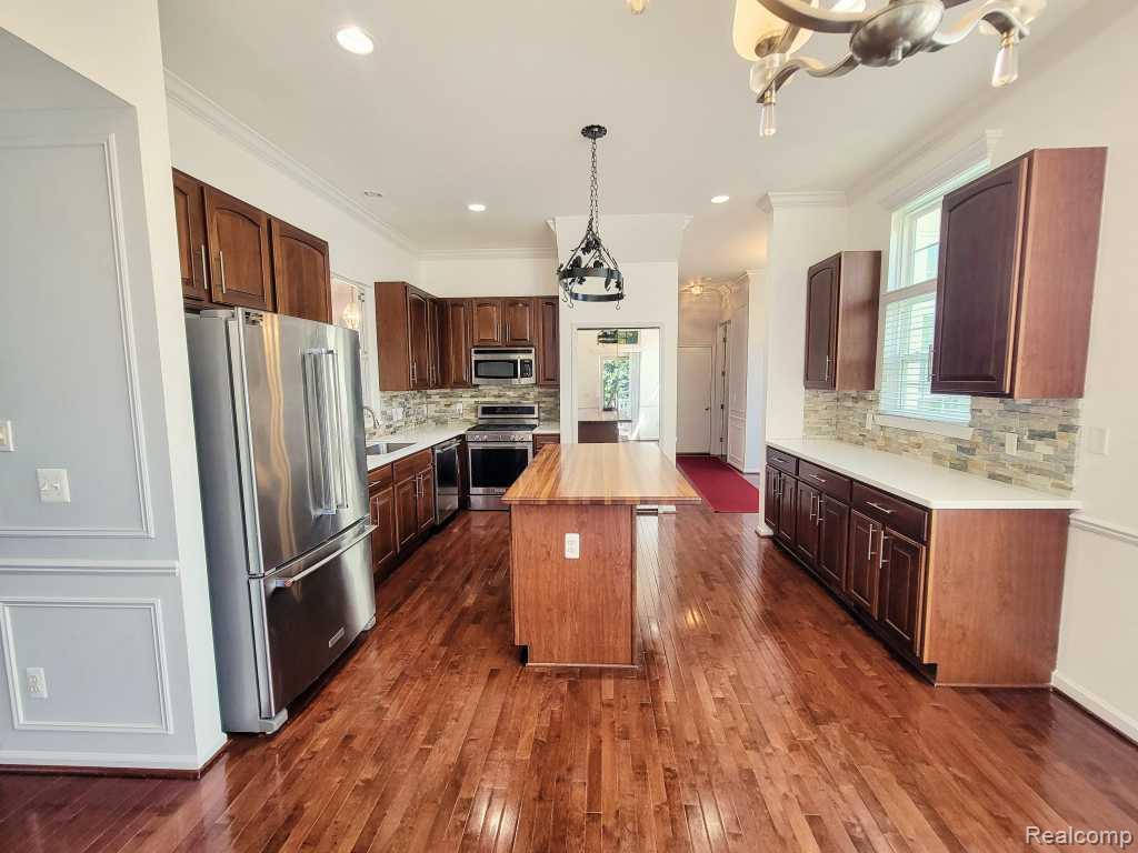 124 Champlain Boulevard, Howell, MI 48843 — Photo 14