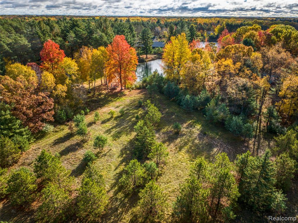 6310 Kilkenny Drive, Canadian Lakes, MI 49346 — front exterior