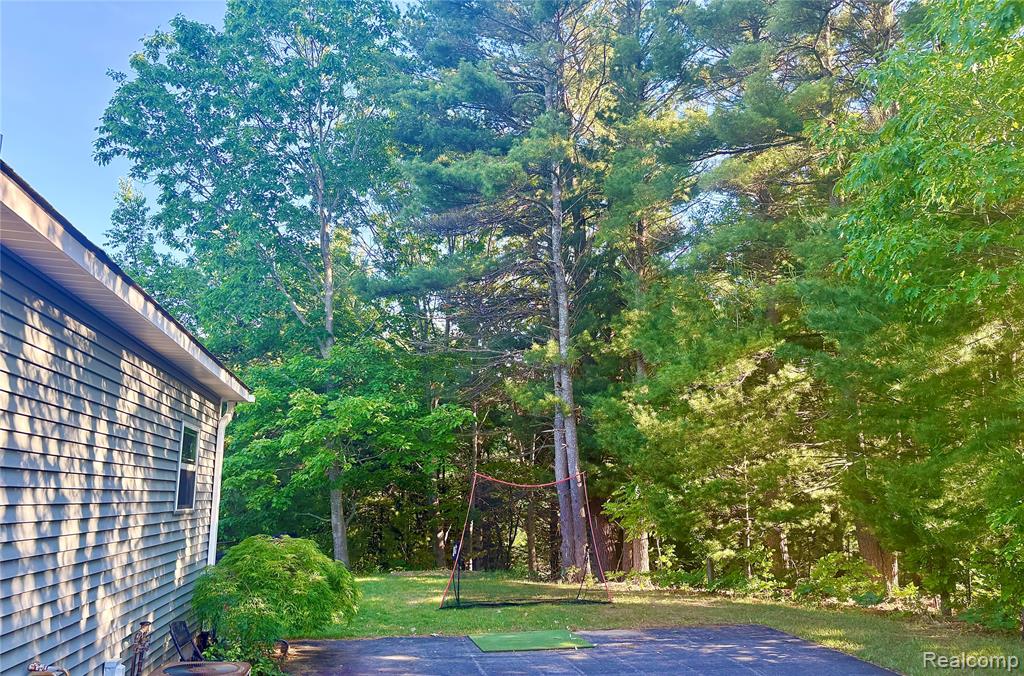9865 Loons Call Drive, Traverse City, MI 49685 — Photo 28