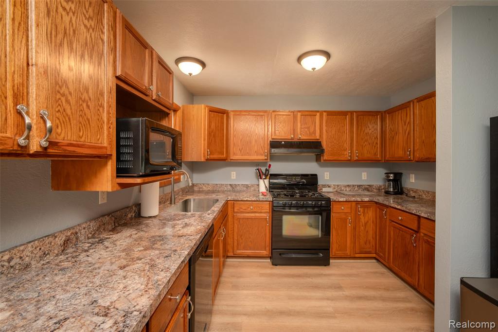 6954 AARWOOD Trail NW, Rapid City, MI 49676 — Photo 15