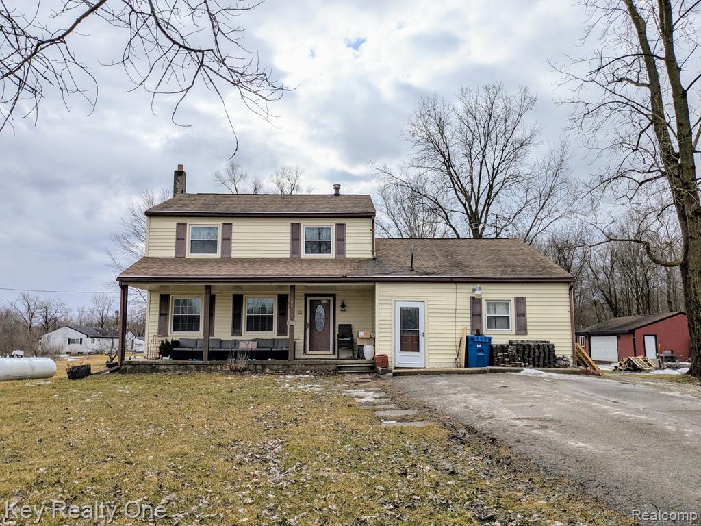 8033 LAMBS Road, Wales, MI — front exterior