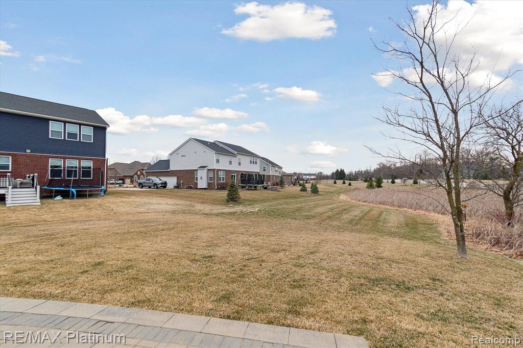 61082 SHAYA Boulevard, South Lyon, MI 48178 — Photo 49
