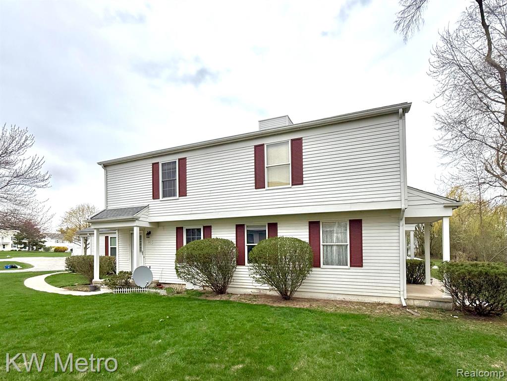 223 NEPTUNE Drive, Walled Lake, MI 48390 — front exterior