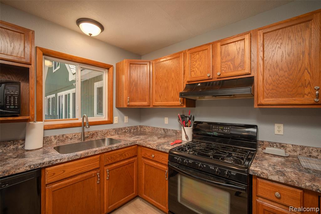 6954 AARWOOD Trail NW, Rapid City, MI 49676 — Photo 16
