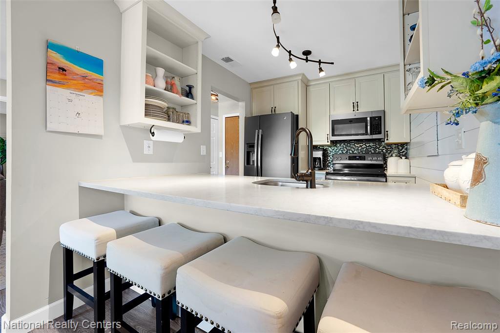 895 S Pontiac Trail, C203, Walled Lake, MI 48390 — Photo 11