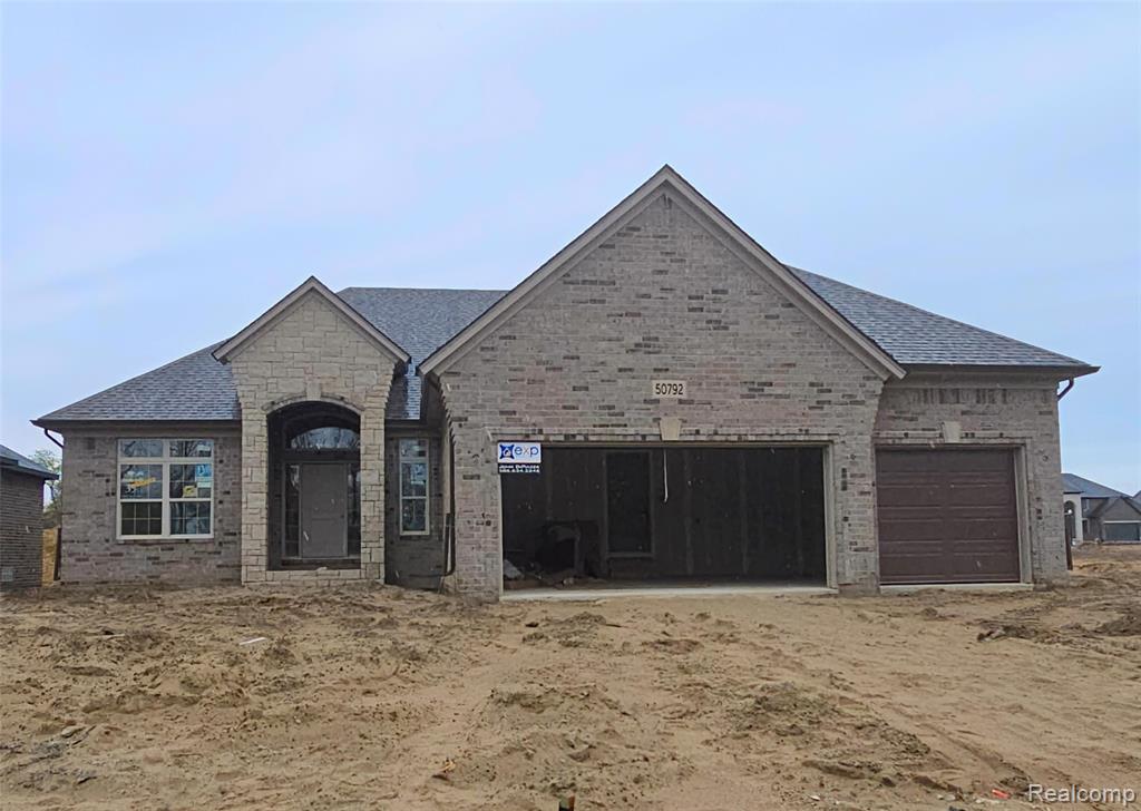 54789 Palomino Dr, Shelby Twp, MI 48316 — front exterior