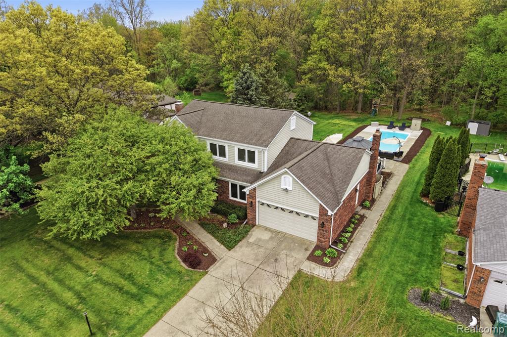 8876 Wintercove Drive, Commerce Twp, MI 48382 — front exterior