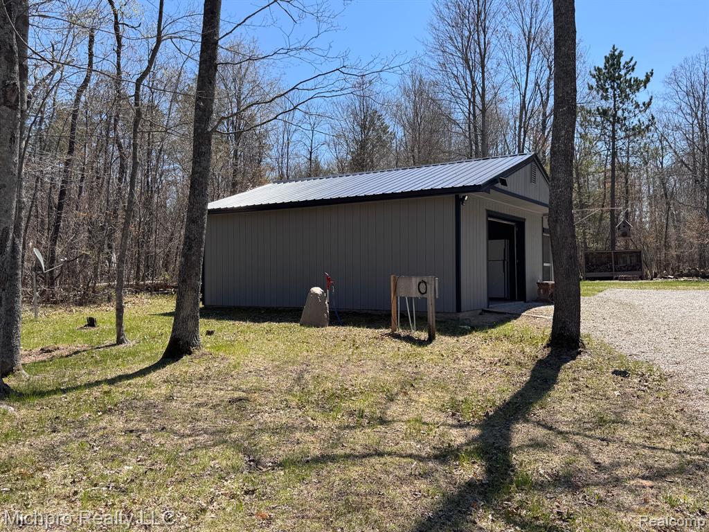 6891 PINE TREE Drive, Glennie, MI 48737 — front exterior