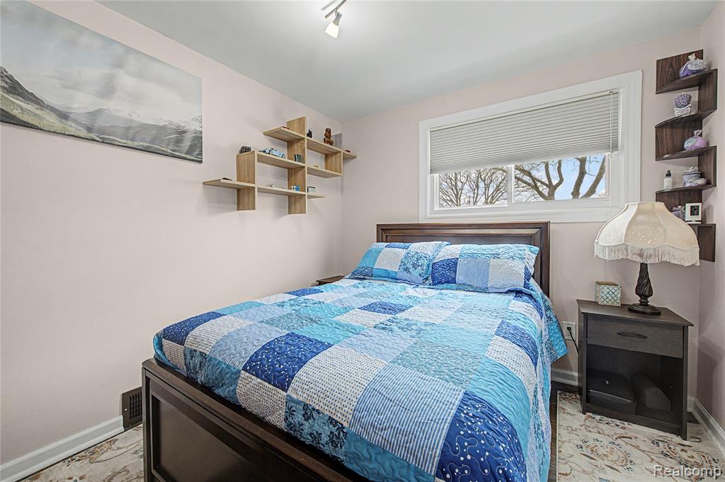 Bedroom with baseboards