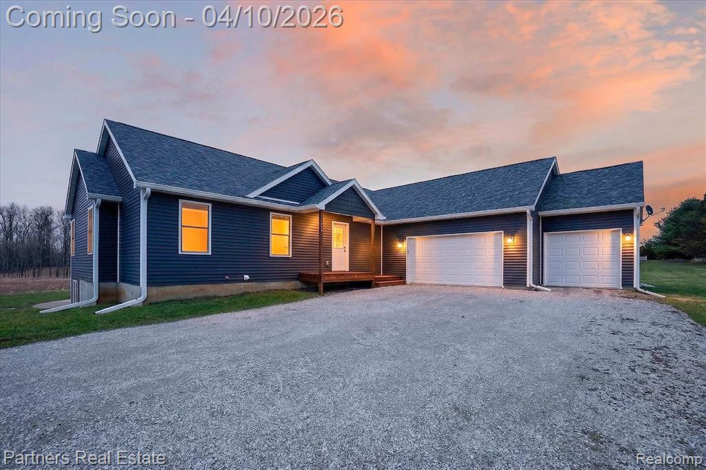 9148 Eva Lane, Fowlerville, MI 48836 — front exterior
