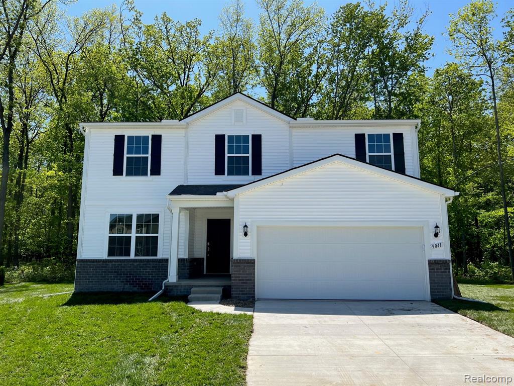 9267 HEMLOCK Lane, Dexter, MI 48130 — front exterior
