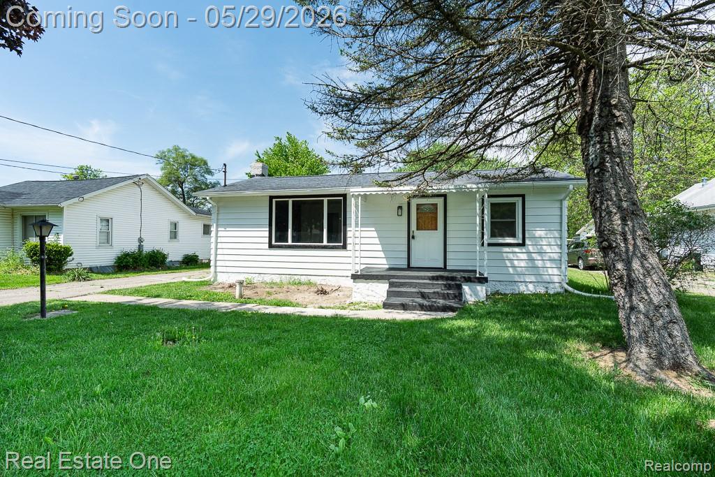 1056 Adams Road, Burton, MI 48509 — front exterior