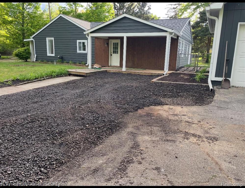 9884 CEDAR ISLAND Road, White Lake, MI — front exterior