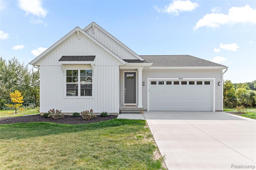 711 W Windward Way, Perry, MI 48872 — front exterior