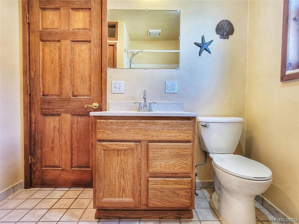 712 Wolverine Drive, Wolverine Lake, MI 48390 — Photo 36