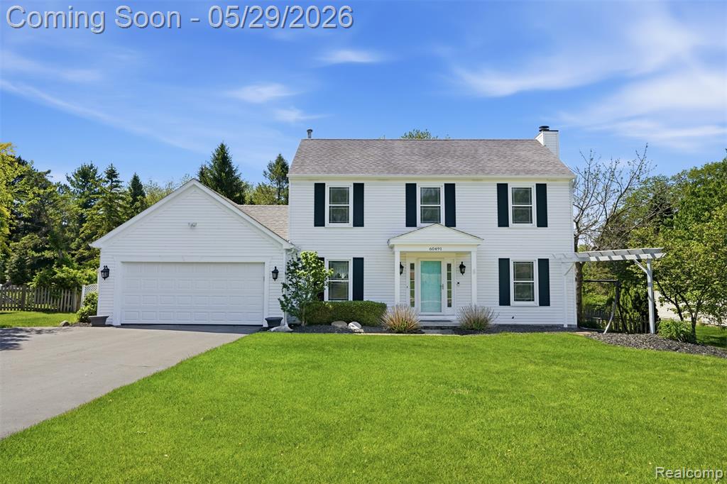 60491 Lamplighter Drive, New Hudson, MI 48165 — front exterior