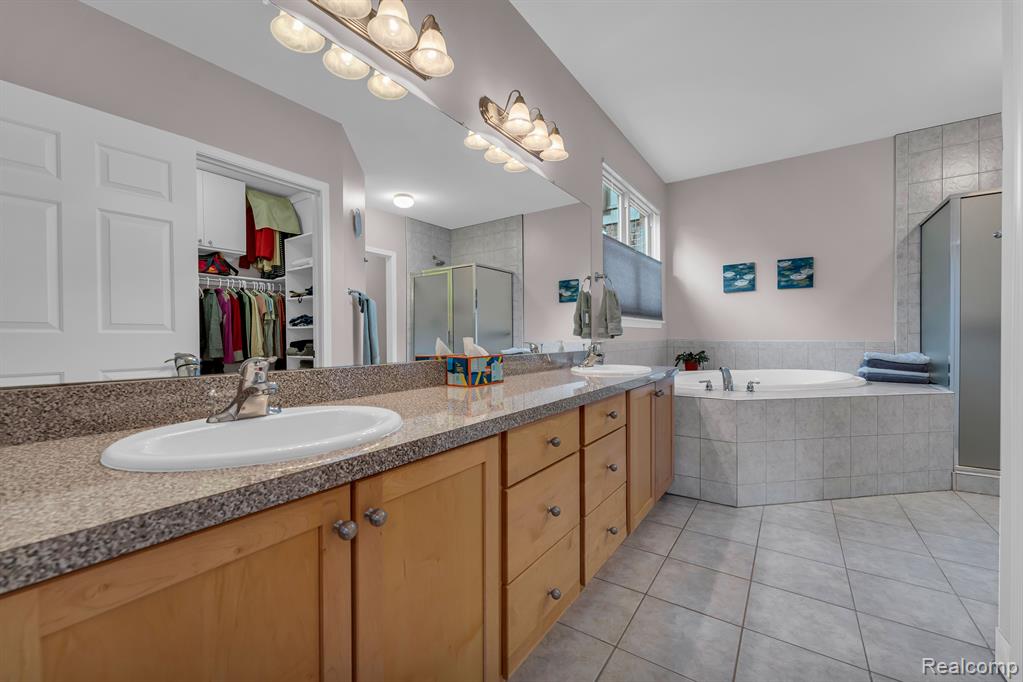 620 FAIRWAYS Lane, Chelsea, MI 48118 — Photo 21