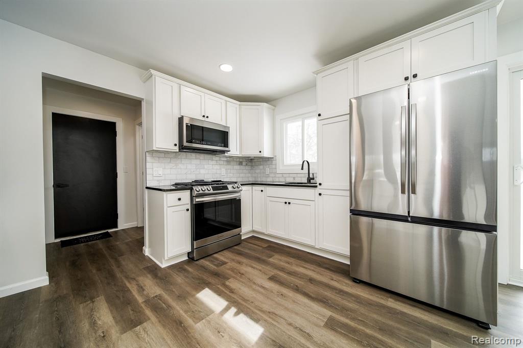 6522 ELLINWOOD Drive, White Lake, MI 48383 — Photo 19