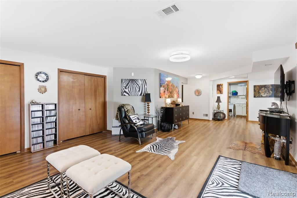 Living room featuring light wood-style flooring