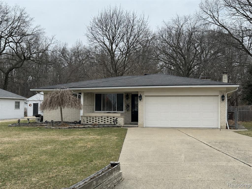 7671 Smiley Avenue, Utica, MI 48316 — front exterior