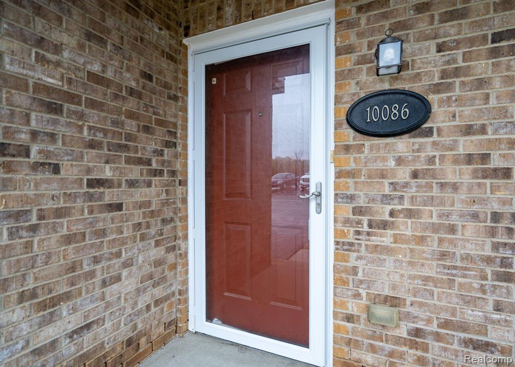 10086 RIDGE RUN Street, 36, Howell, MI 48855 — Photo 2