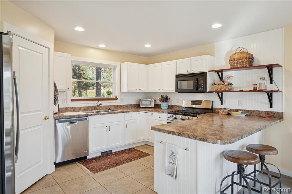 7050 Dibrova Drive, Brighton, MI 48116 — Photo 13